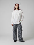 DAXUEN Crinkled long-sleeved button-up shirt — model photo