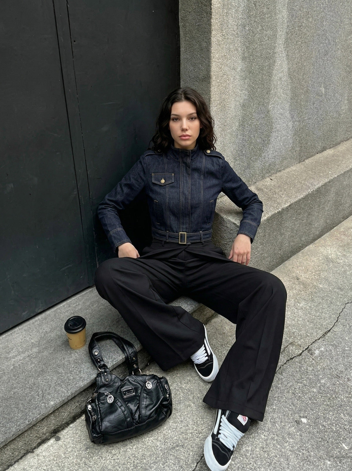 DAXUEN Cropped indigo denim jacket with gold-toned details — model photo