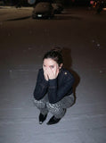 DAXUEN Cropped indigo denim jacket with gold-toned details — model photo