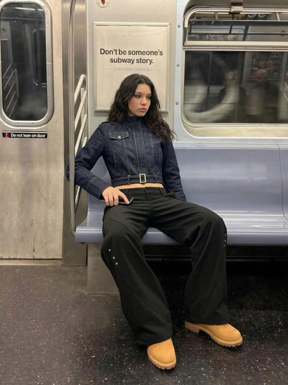DAXUEN Cropped indigo denim jacket with gold-toned details — model photo