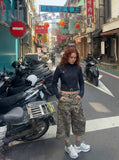 DAXUEN Cropped military denim jacket with gold stitching — model photo
