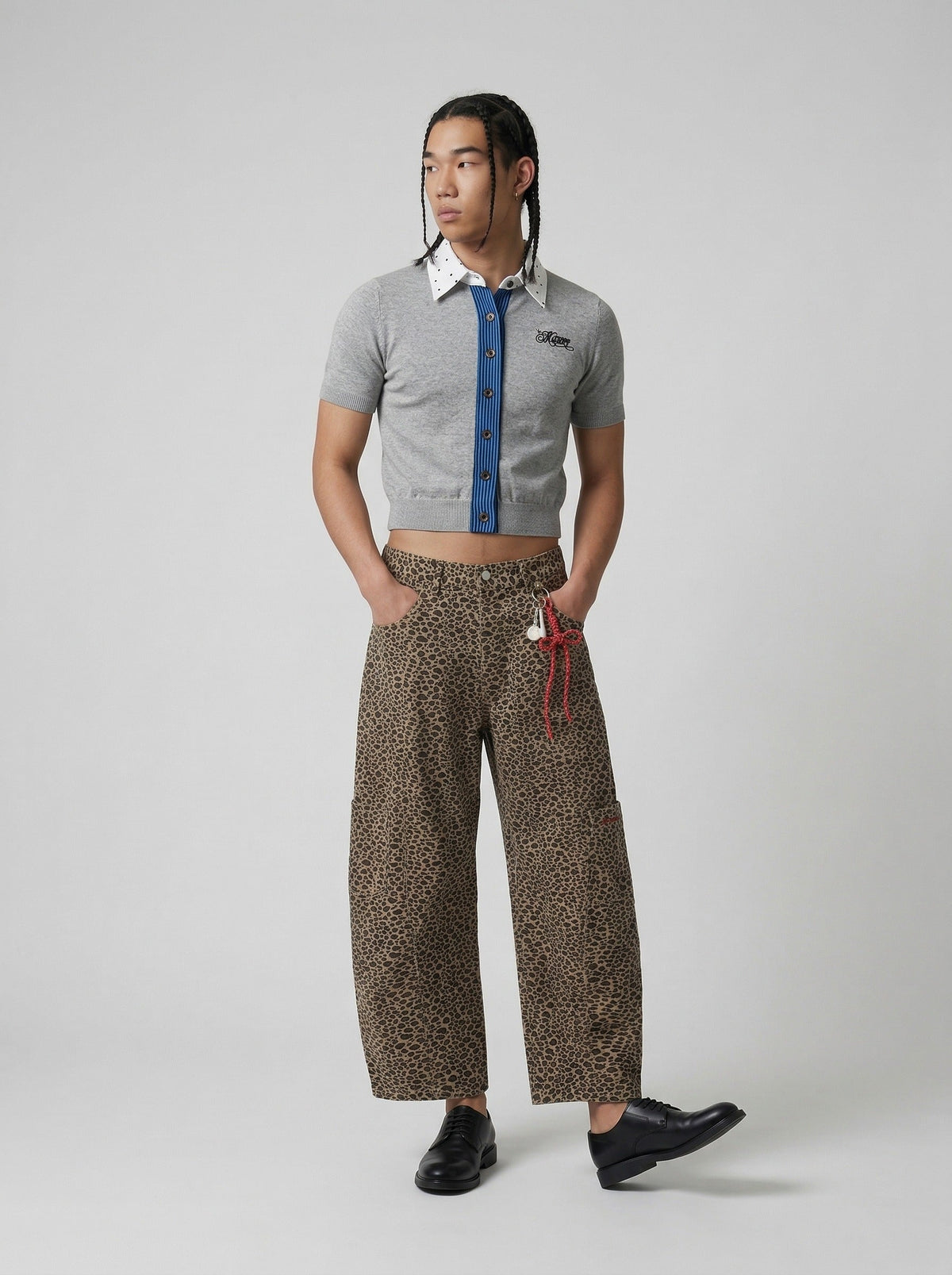 DAXUEN Cropped polka dot knit top with collar — model photo