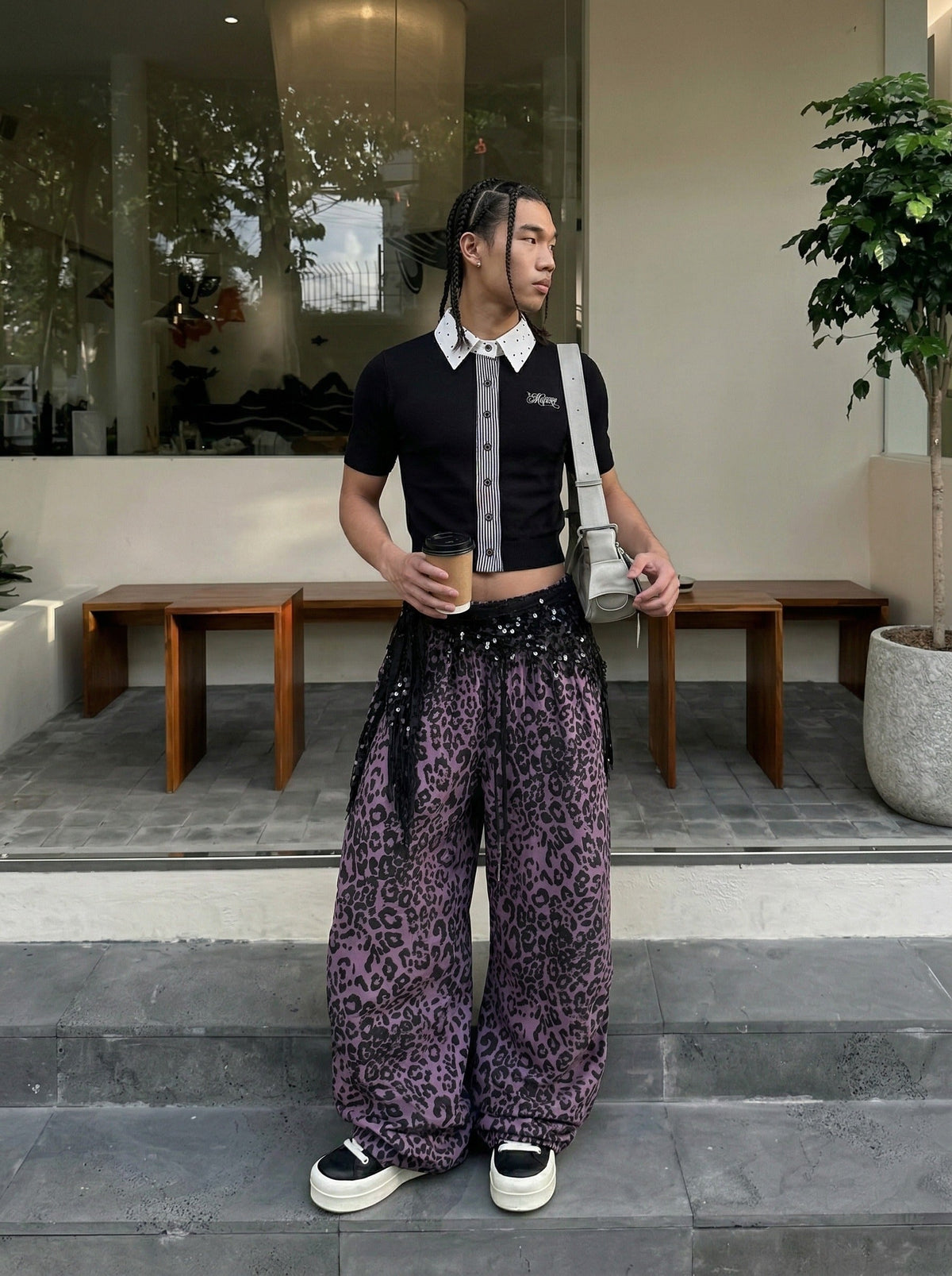 DAXUEN Cropped polka dot knit top with collar — model photo