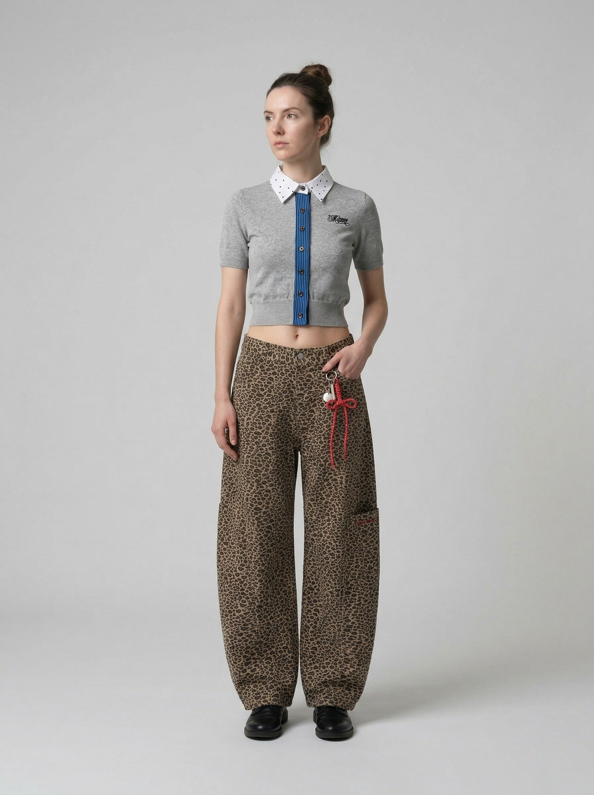 DAXUEN Cropped polka dot knit top with collar — model photo