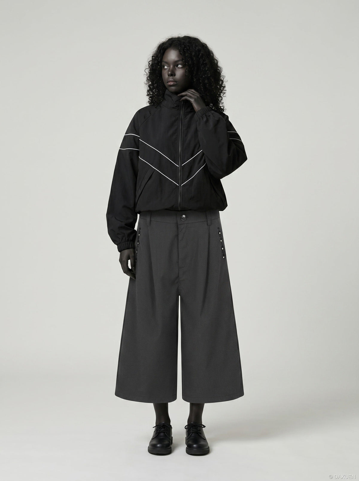 DAXUEN Cropped wide-leg culotte pants with pinstripes — model photo