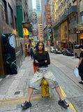 DAXUEN Cropped wide-leg digital print pants with bear graphic — model photo