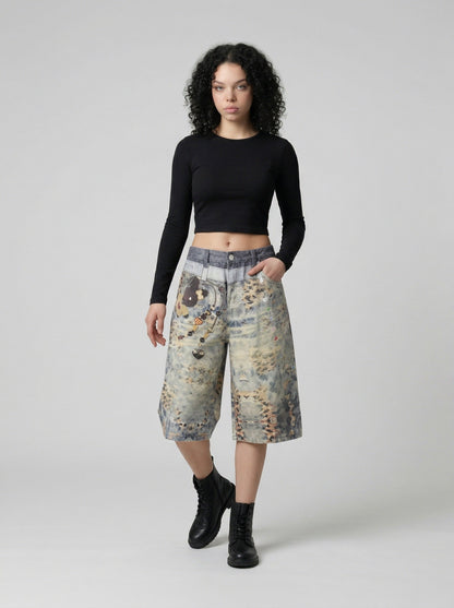 DAXUEN Cropped wide-leg digital print pants with bear graphic — model photo