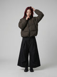 DAXUEN Cropped wide-leg trousers in black and charcoal grey — model photo