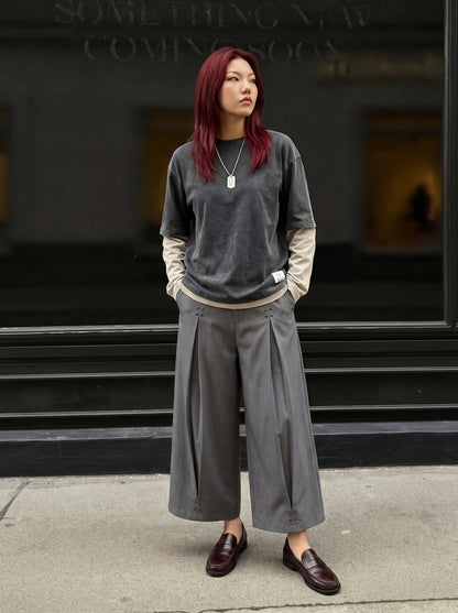 DAXUEN Cropped wide-leg trousers in medium-grey with decorative studs — model photo