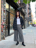 DAXUEN Cropped wide-leg trousers in medium-grey with decorative studs — model photo