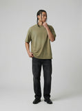 DAXUEN Oversized short-sleeved t-shirt with cross embroidery — model photo