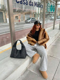 DAXUEN Wide leg sweatpants with cross print and script embroidery — model photo