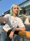 DAXUEN White short-sleeved t-shirt with abstract graphic — model photo