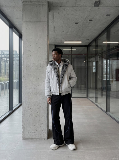 DAXUEN soft matte knit flared pants with contrast stitching — model photo