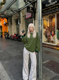 DAXUEN soft matte knit flared pants with contrast stitching — model photo