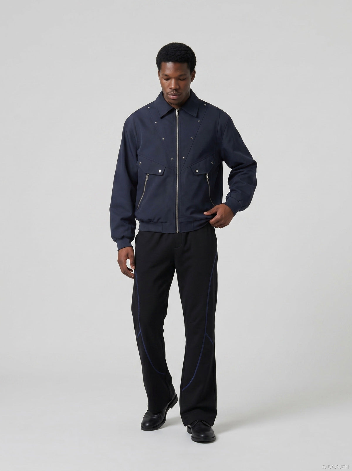 DAXUEN soft matte knit flared pants with contrast stitching — model photo