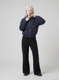 DAXUEN soft matte knit flared pants with contrast stitching — model photo