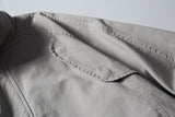 DAXUEN black bomber jacket with curved chest flaps
