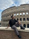 DAXUEN solid grey oversized curved-hem tee — model photo