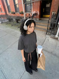 DAXUEN solid grey oversized curved-hem tee — model photo