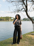 DAXUEN solid grey oversized curved-hem tee — model photo
