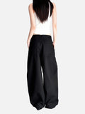 DAXUEN dark grey curved leg high-rise trousers with button detail
