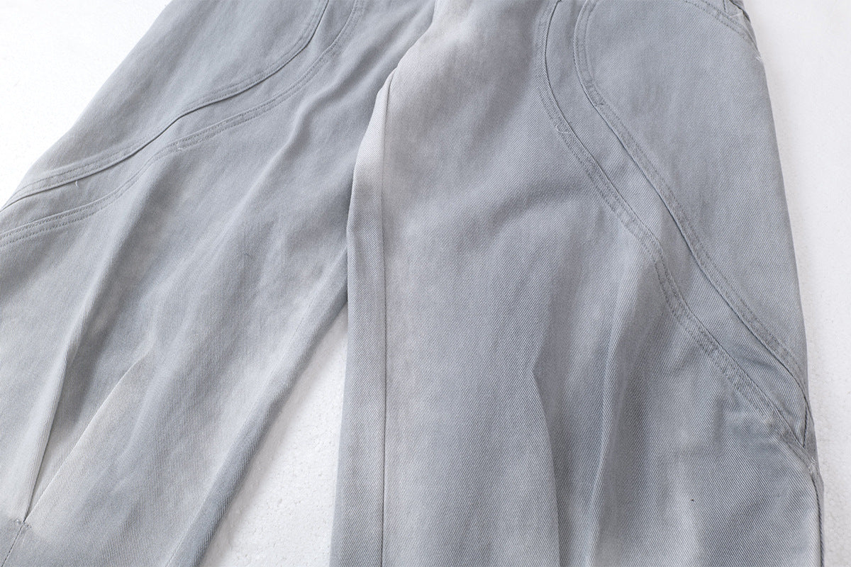 DAXUEN faded grey oversized curved-panel denim pants