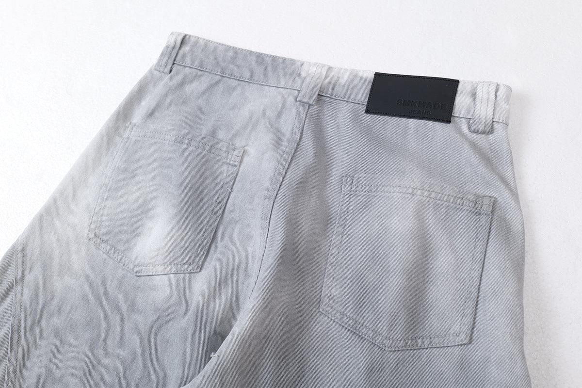 DAXUEN faded grey oversized curved-panel denim pants