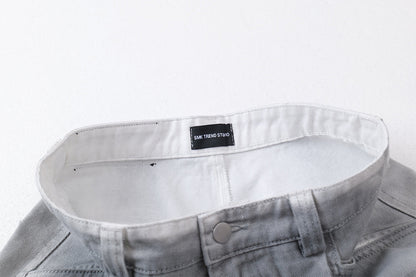 DAXUEN faded grey oversized curved-panel denim pants