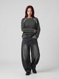 DAXUEN washed black wide-leg denim jeans with curved seams — model photo