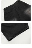 DAXUEN washed black wide-leg denim jeans with curved seams