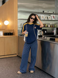 DAXUEN white baseball-stitch graphic t-shirt — model photo