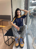 DAXUEN white baseball-stitch graphic t-shirt — model photo