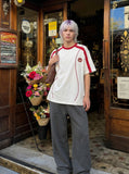 DAXUEN white baseball-stitch graphic t-shirt — model photo
