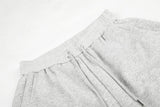DAXUEN grey wide-leg shorts with curved stripes
