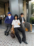 DAXUEN Graphic t-shirt featuring an apple and bear design — model photo