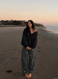 DAXUEN Wide leg denim trousers with dachshund embroidery — model photo