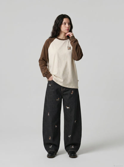 DAXUEN Wide leg denim trousers with dachshund embroidery — model photo