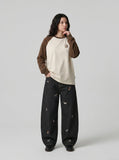 DAXUEN Wide leg denim trousers with dachshund embroidery — model photo