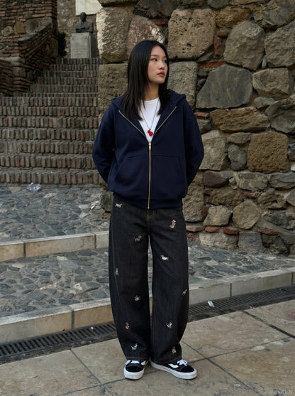DAXUEN Wide leg denim trousers with dachshund embroidery — model photo
