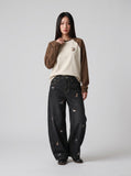 DAXUEN Wide leg denim trousers with dachshund embroidery — model photo
