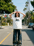 DAXUEN white oversized dachshund graphic tee — model photo