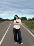 DAXUEN white oversized dachshund graphic tee — model photo