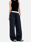 DAXUEN dark blue grid casual pants