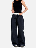 DAXUEN dark blue grid casual pants