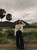 DAXUEN heathered light beige botanical print knit top — model photo