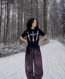 DAXUEN Dark Cross Graphic Knitted T-Shirt — model photo
