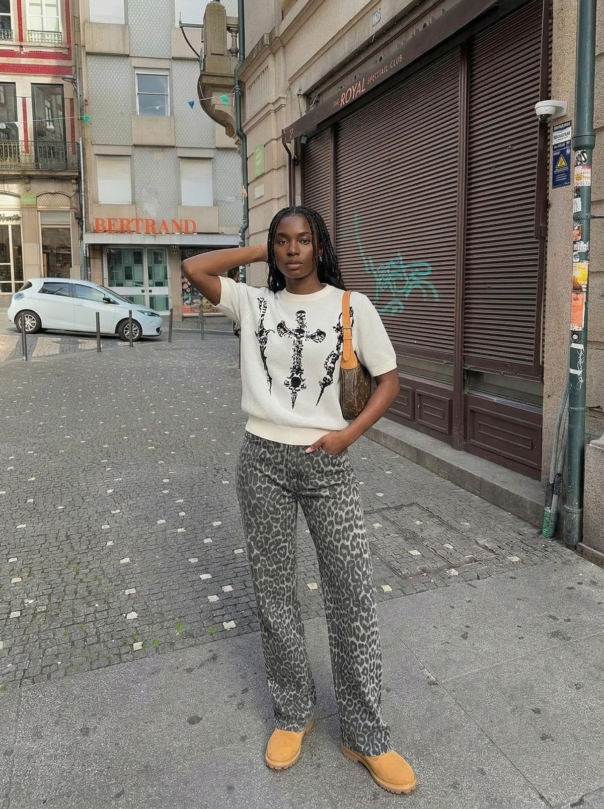 DAXUEN Dark Cross Graphic Knitted T-Shirt — model photo