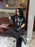 DAXUEN Dark Cross Graphic Knitted T-Shirt — model photo