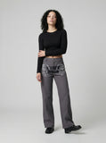 DAXUEN Dark grey women's flared pants with graphic details — model photo